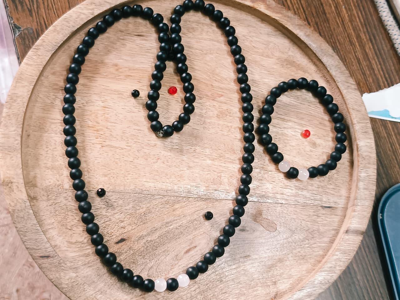 black and white men wear mala with bracelet c