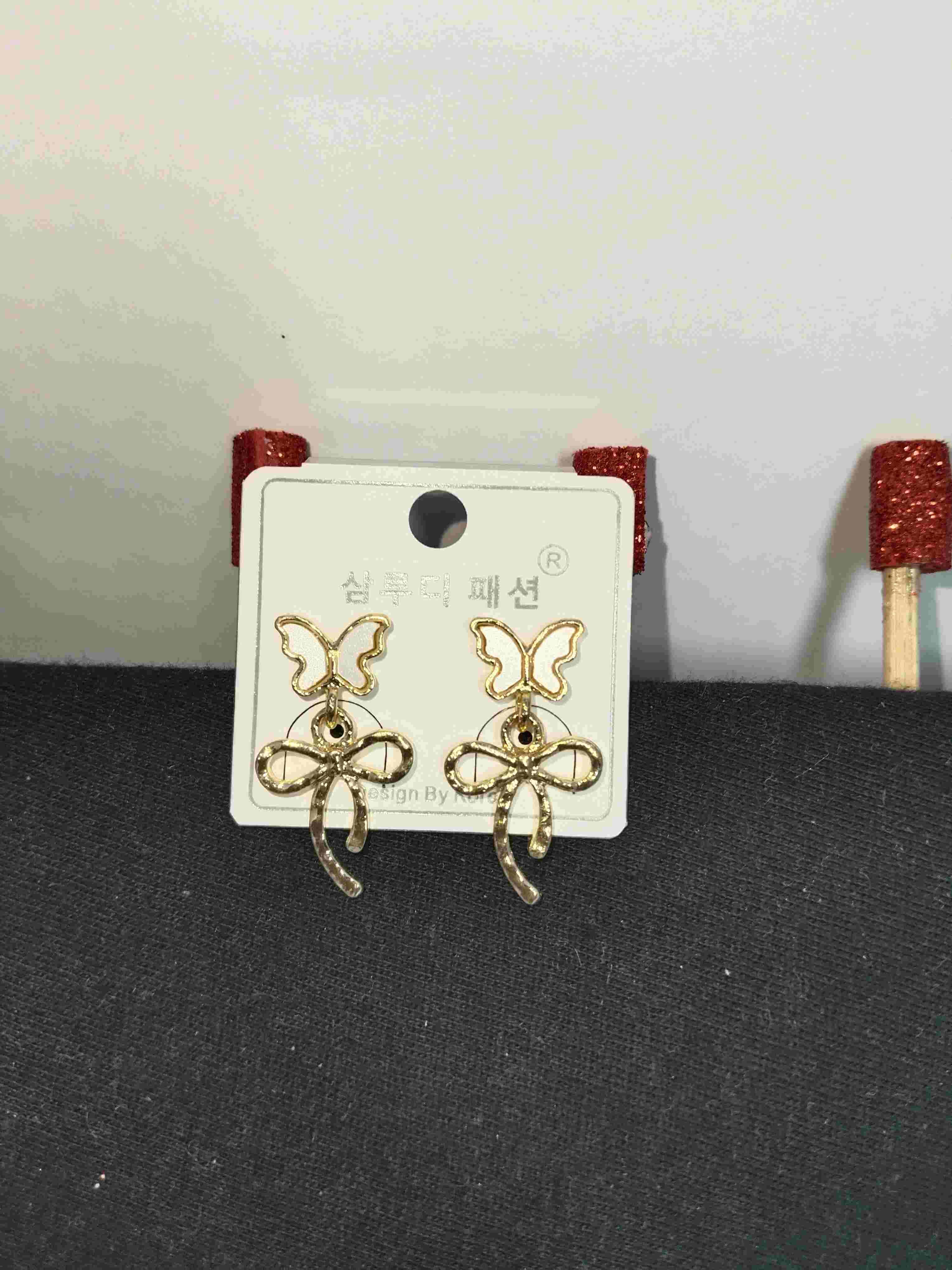 Trendy white enamel butterfly earring